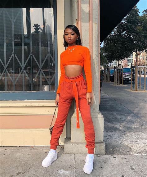 rocking neon orange outfit